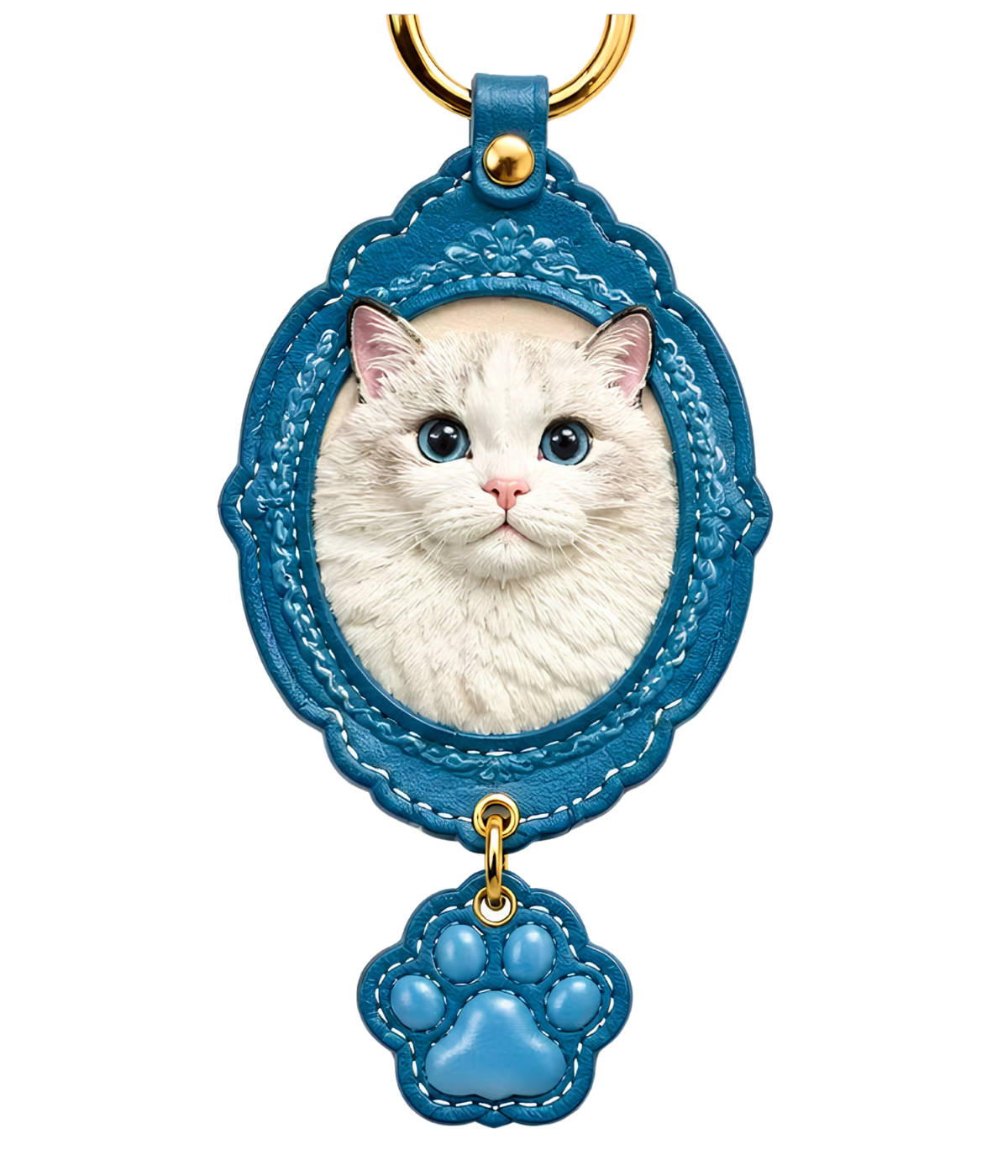 Pet relief ornament with white cat face, blue stitched oval backing, dangling paw charm