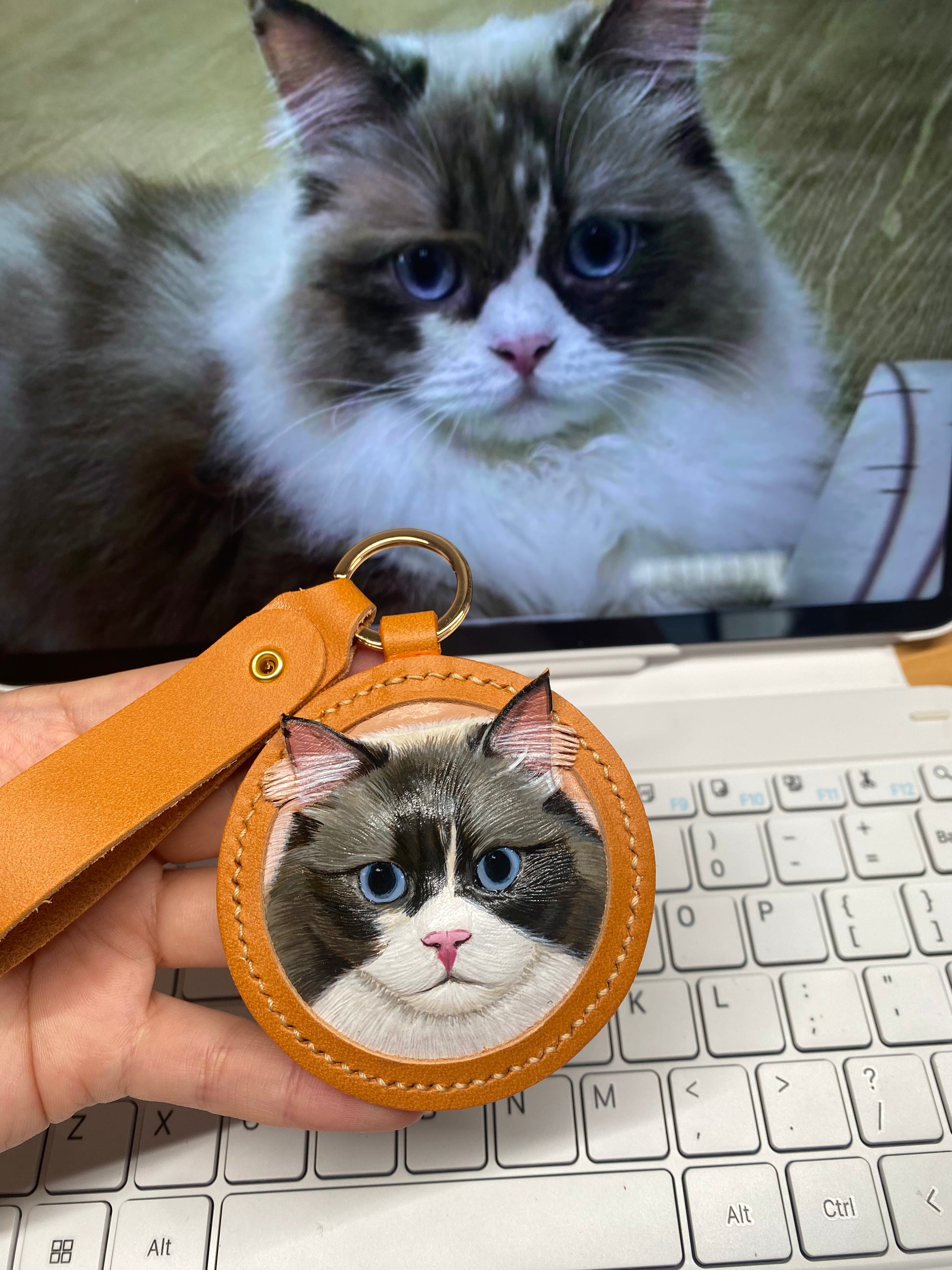 Cat face custom 3D relief ornament with brown leather strap and metal keyring